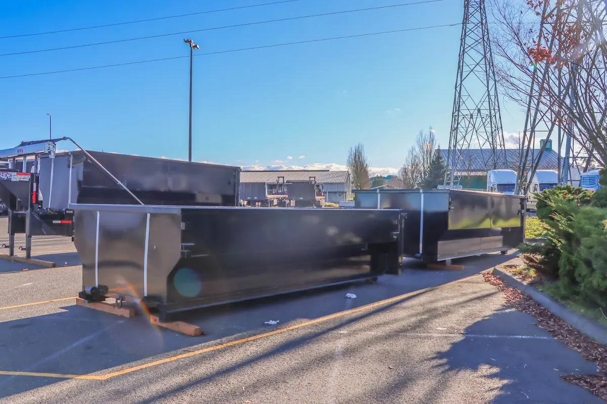 Roll-off dumpster ready for waste disposal at job site for Construction Dumpster Rental in Sterling